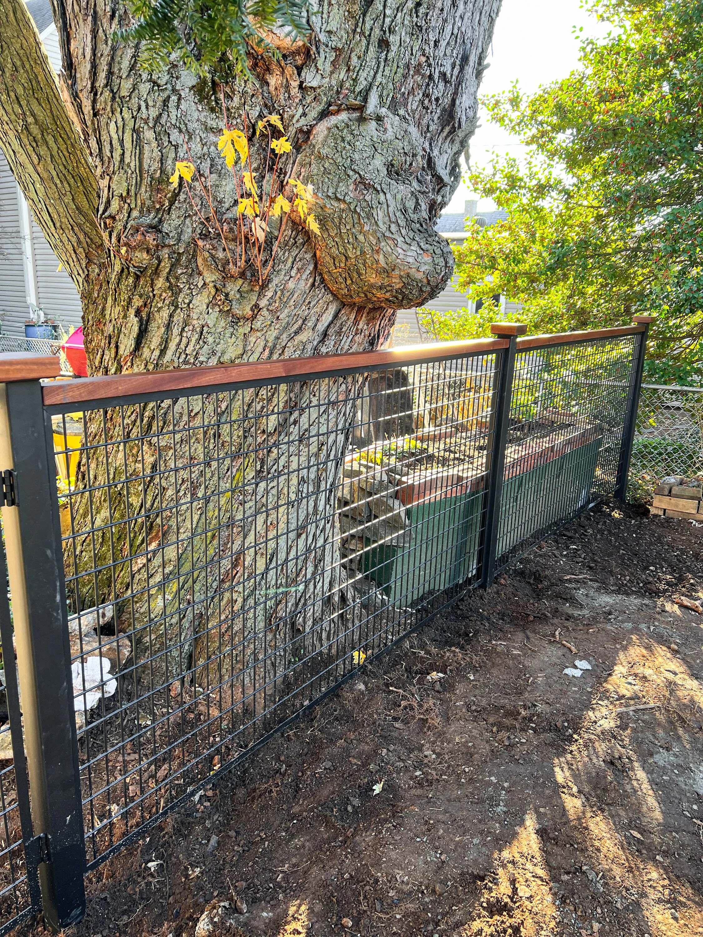 Everything Anything Wood and Metal residential backyard gate in steel with teak handrail