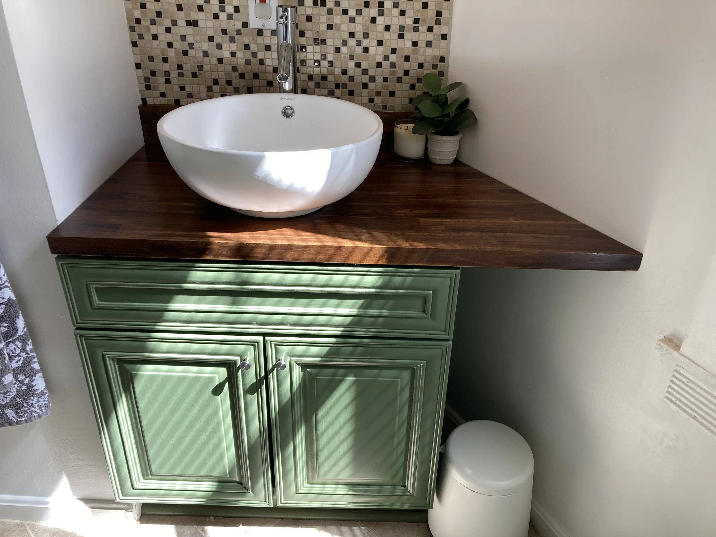 custom vanity counter for bathroom nook, paired with modern acccents and bowl sink, custom woodworking baltimore maryland