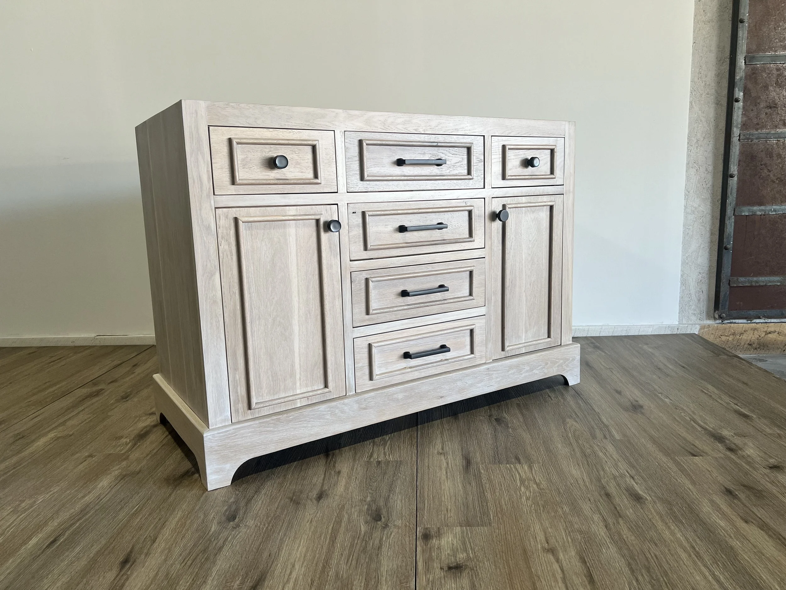 antique look bathroom vanity, white washed wood, trim details, custom woodwork custom metalwork baltimore maryland,