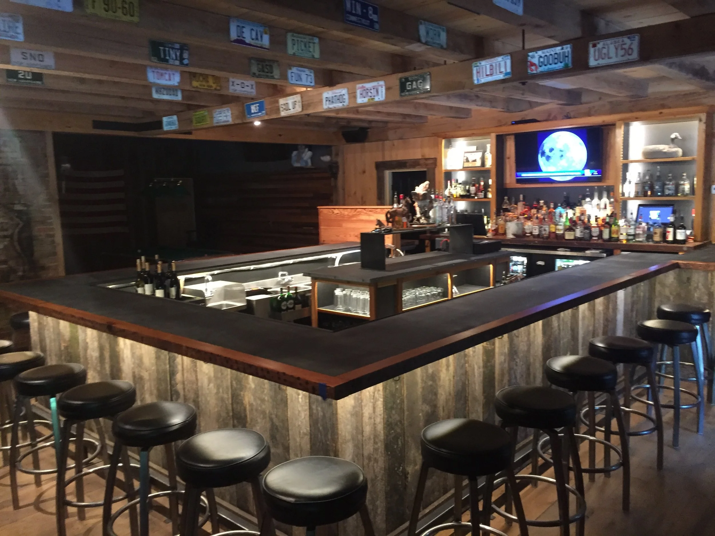 custom bartop for divebar, zinc center with wood banding, patinas over time, custom restaurant bar