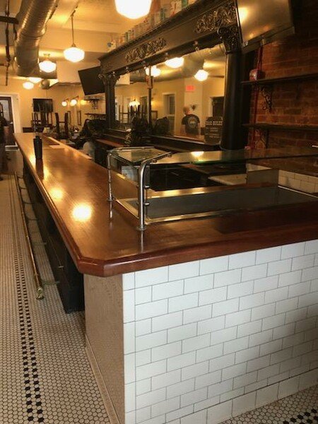 custom cafe bar top in mahogany, custom woodworkers baltimore maryland, dark wood bar top