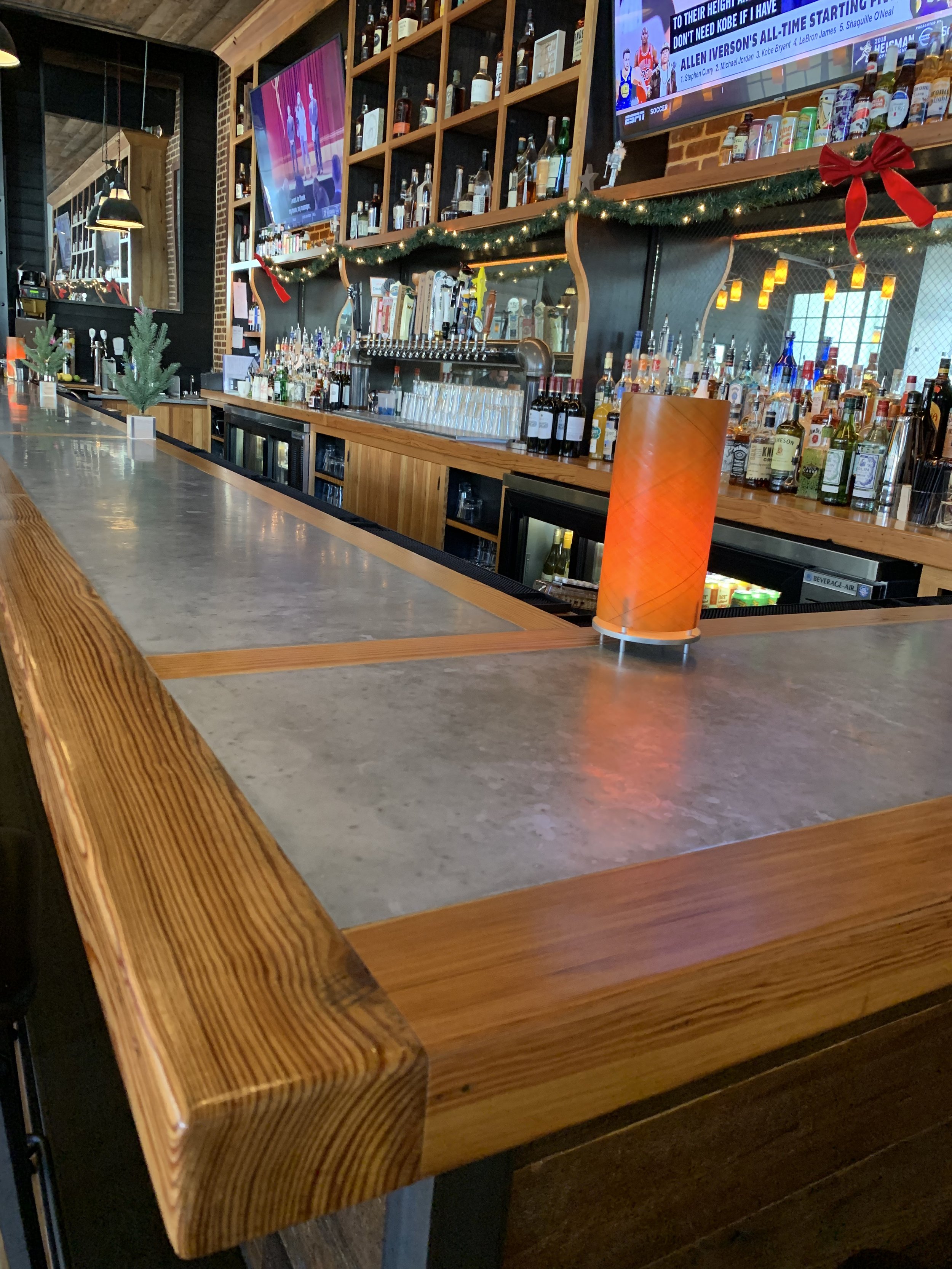 custom bartop for divebar, zinc center with wood banding, patinas over time, custom restaurant bar