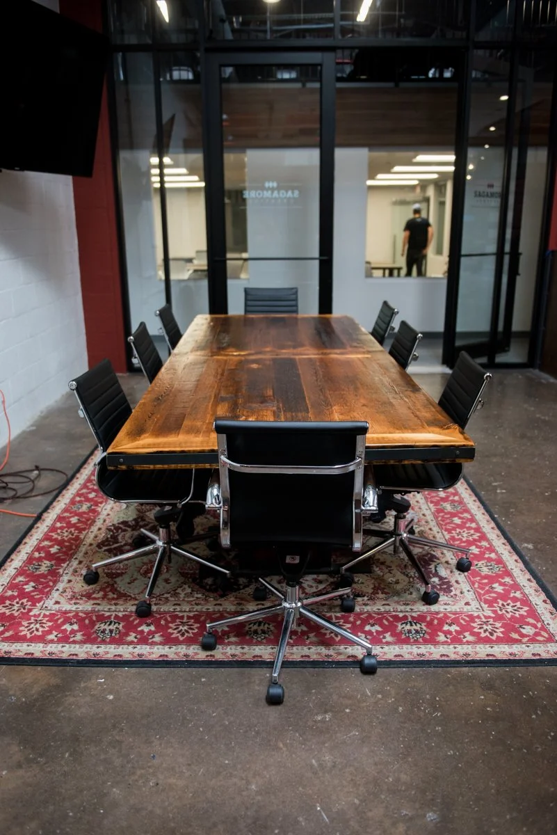 reclaimed pine conference table with steel accents rustic industrial look construction executive office