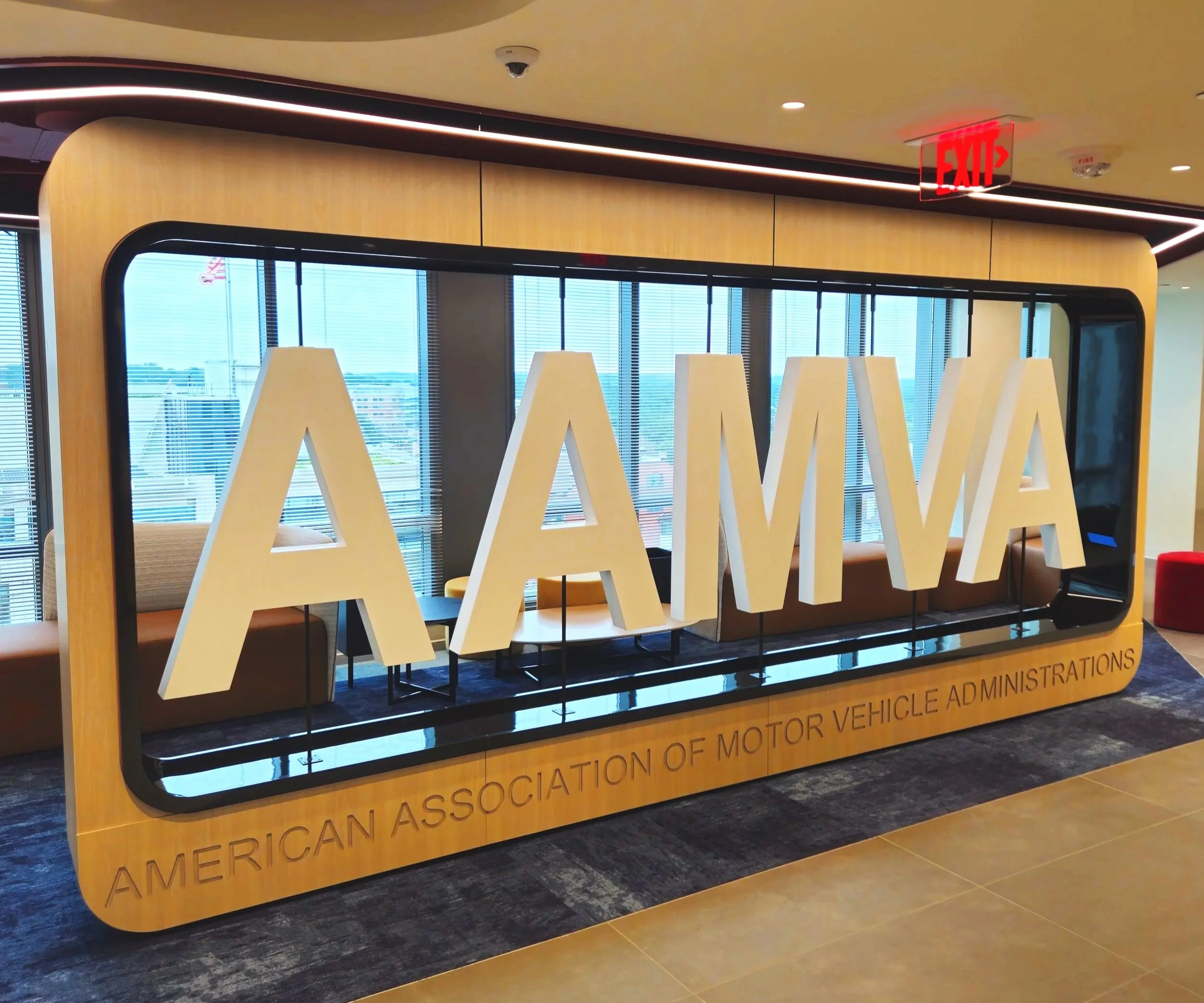 oversized dimensional lettering accent feature, large lobby space, large white floating letters, custom woodwork baltimore maryland