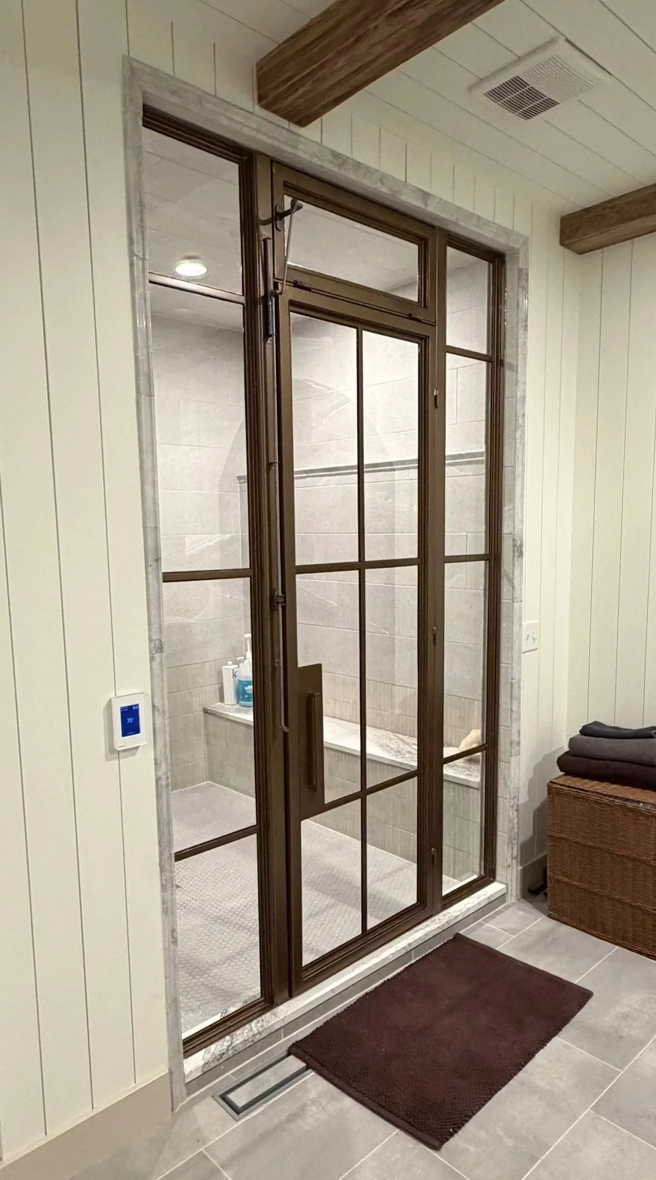 faux brass look shower enclosure, custom shower enclosure, custom metal work baltimore, custom interiors baltimore
