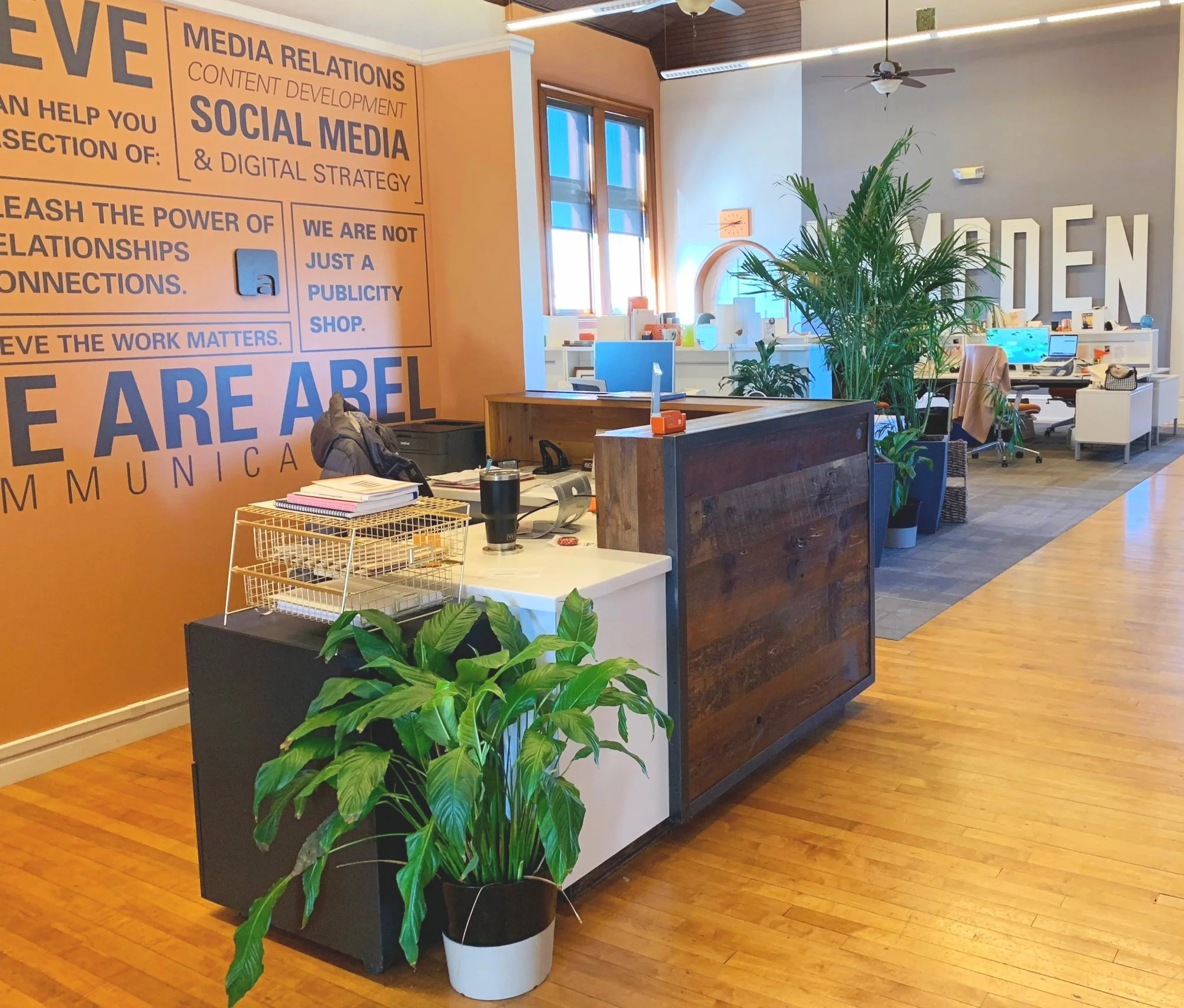 custom reception desk from reclaimed wood, rustic industrial modern office