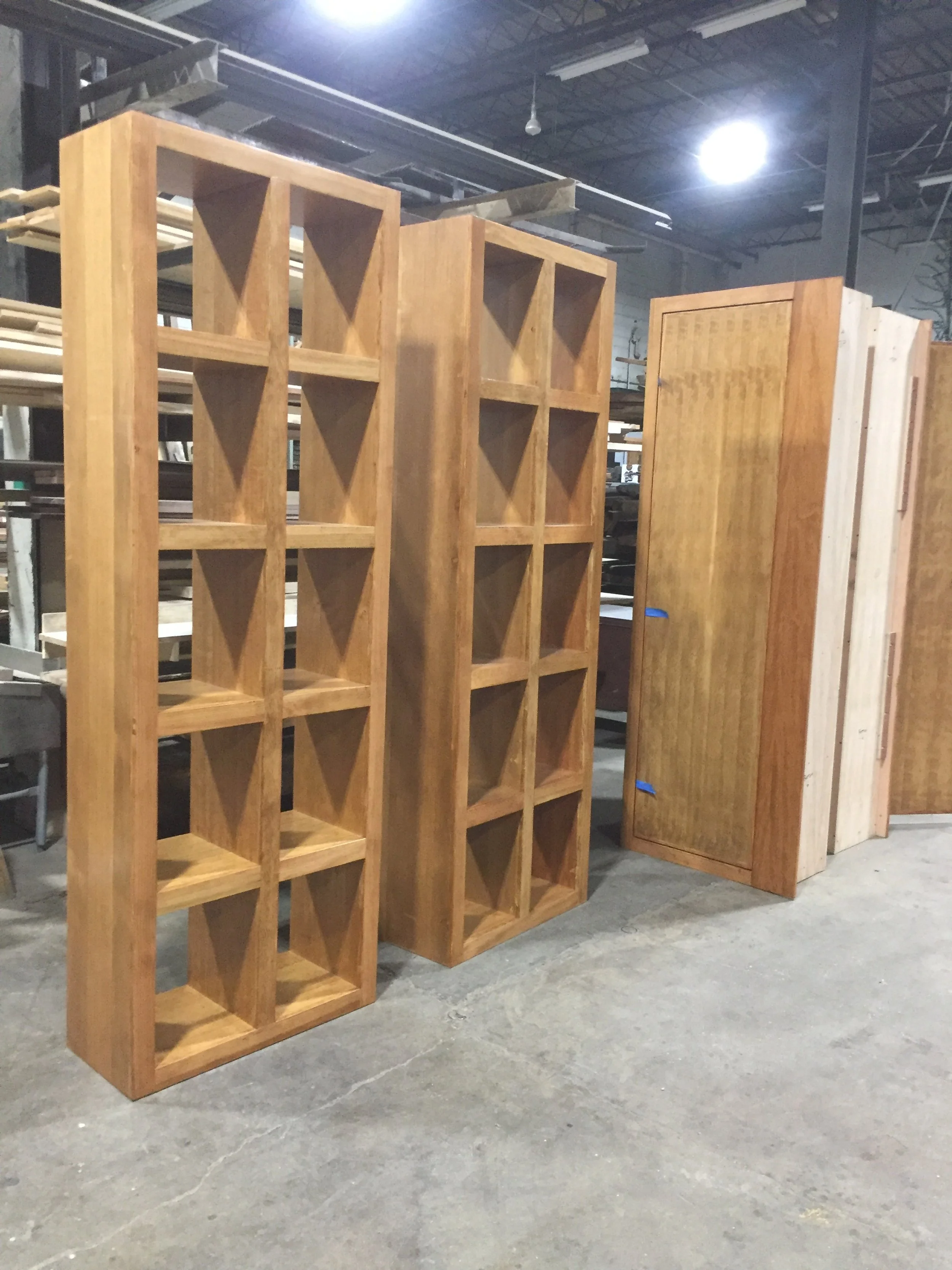 light wood large display cubbies, restaurant room divider, accent wall, custom woodwork custom metalwork baltimore maryland, lobby award display