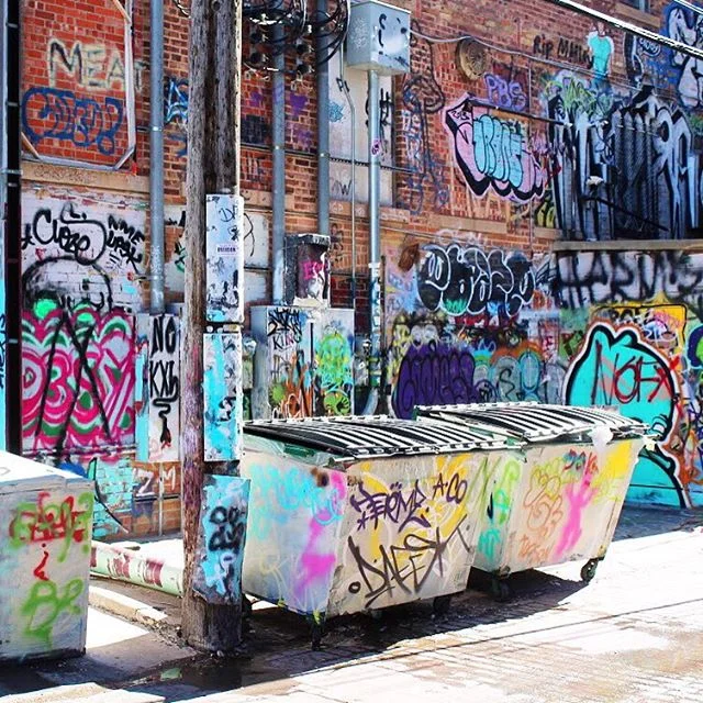 I love wild street art. Graffiti on graffiti on graffiti. Bright colors. Electric emotion. Artistic off-the-cuff expression. This picture makes you want to reach out and touch it all. And grab a spray can, find a corner of the wall and contribute to its never ending story. Photo by @josefharris of @bodega_ltd