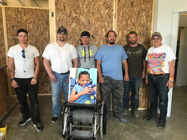 The completed wall with Cole, dan, anderson, sena, nick, and paul