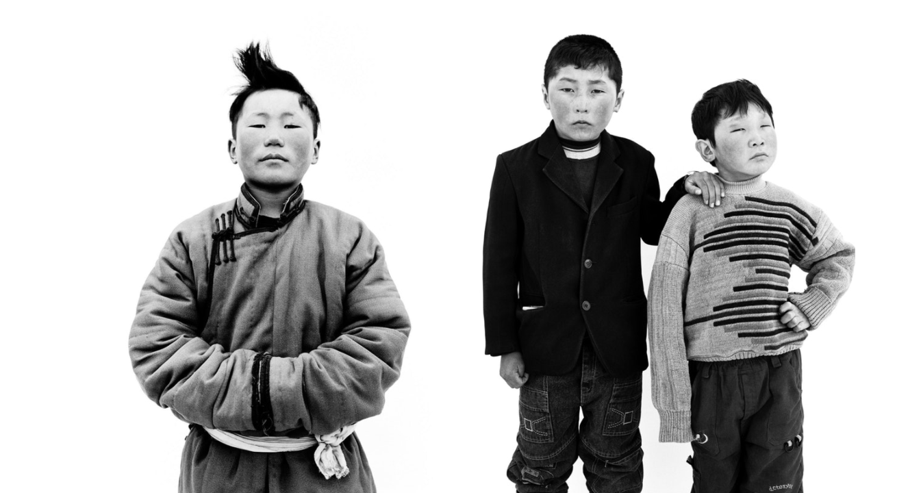 A boy from Kharkhorin (Хархорин) wearing a traditional “deel”or robe, with a silk sash. / Two brothers from Khövsgöl Lake (Хөвсгөл нуур).