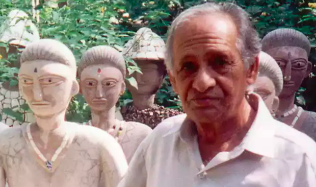 Nek Chand surrounded by his sculptures. Image Credit: The Guardian