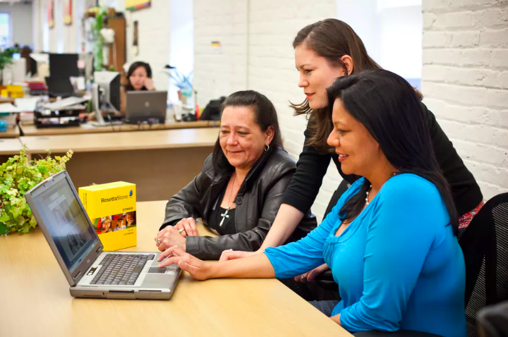 Members of the Chitimacha language team (from left to right) Sam Boutte, Kim Walden and Rachel Vilcan use the new language software for the first time. Author provided