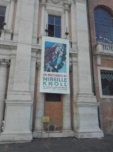 A banner in Rome commemorates the life of Mireille Knoll, a Holocaust survivor who was murdered in her apartment in Paris last year. Jove. CC0.
