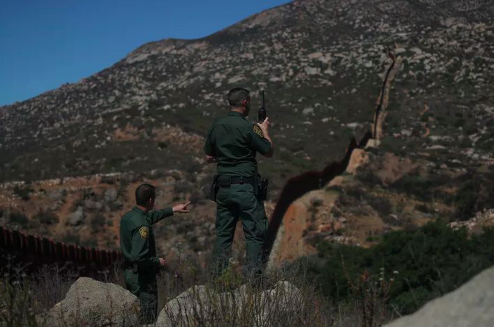 A steel wall along the U.S. border near Tecate, California, cuts across Mount Cuchame, a site sacred to the Kumeyaay people. Reuters/Adrees Latif