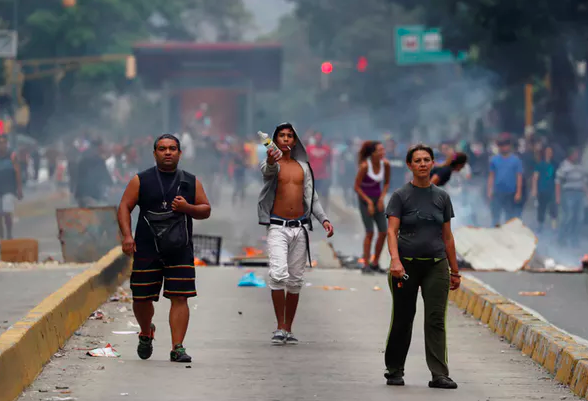 Venezuelans protest water shortages in Caracas on March 31, 2019. Reuters/Carlos Garcia Rawlins