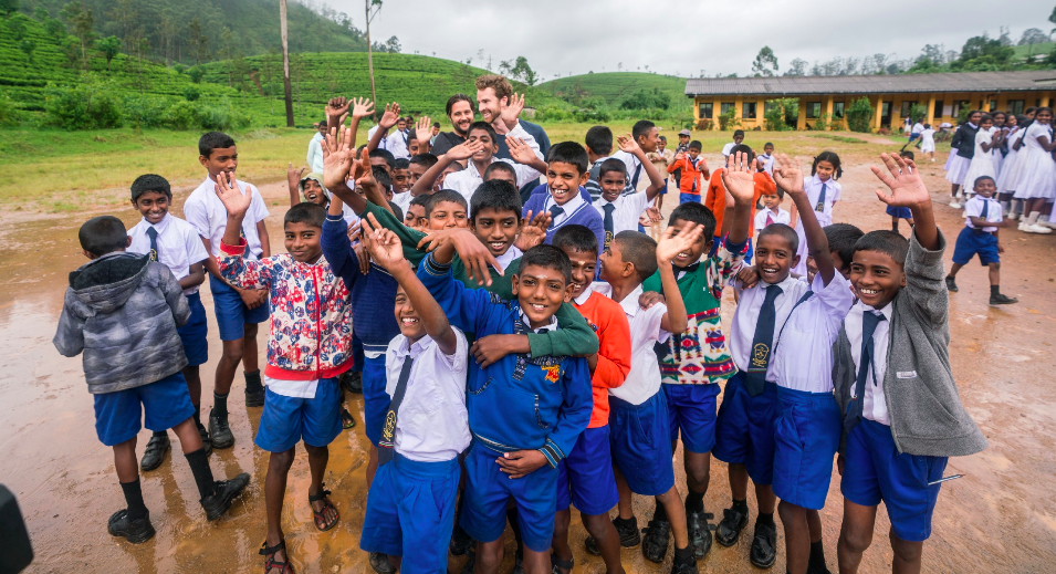 Schoolyard antics in Sri Lanka with Matt Moreau and Kori Chilibeck of The Earth Group.
