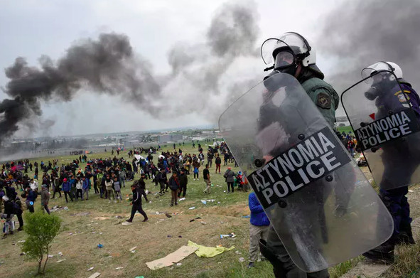 Immigration policy remains a contested issue across Europe. Here, riot police try to stop migrants from crossing Greece’s northern border to journey farther into Europe, April 6, 2019. Reuters/Alexandros Avramidis