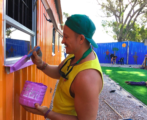 Remote Year’s Director of Community Development and Positive Impact, Travis King, volunteering with the RY Ohana group in Cape Town, South Africa, with partner, Phillipi Music Project. Photographer and CC Travis King.
