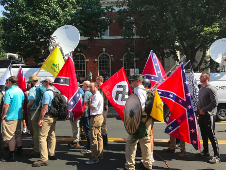 White supremacists gathered for the Unite the Right rally in Charlottesville, Virginia. By Anthony Crider. CC by 2.0.