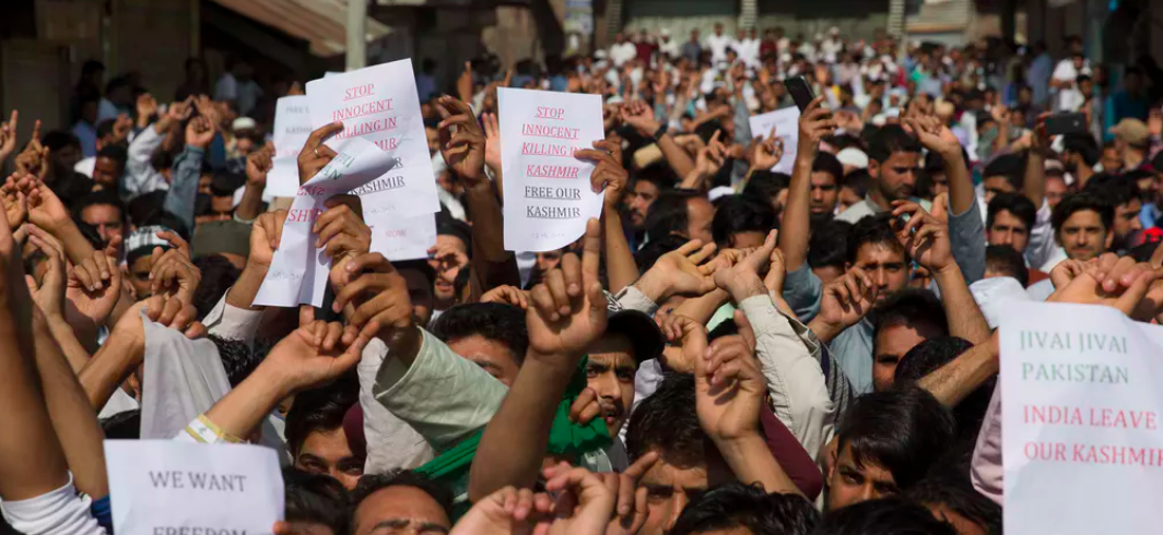 Kashmiri Muslims shout slogans during a protest after Eid prayers in Srinagar. AP Photo/ Dar Yasin