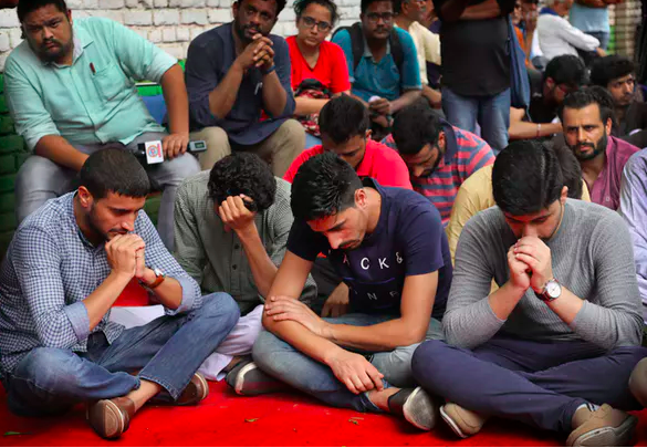 Kashmiris living in New Delhi gather for a function to observe Eid al-Adha away from their homes in New Delhi. AP Photo/Manish Swarup