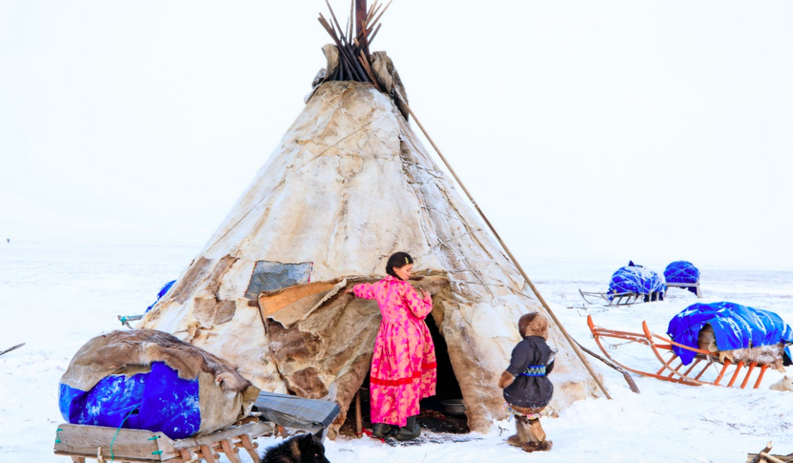 Once the ground has frozen and a deep enough layer of snow has settled, Lena and her family can pack up their home and belongings onto their traditional wooden sledges, pulled by reindeer, and embark on their annual migration to find winter grazing lands for their herd. / prints available