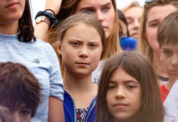 Thunberg at a school strike in Washington, DC. Aschwaphoto/Shutterstock.