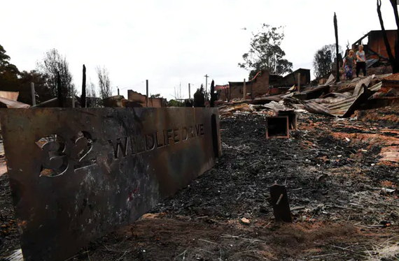 Residents of bushfire-prone areas that become impossible to defend might have to consider moving. Dean Lewins/AAP