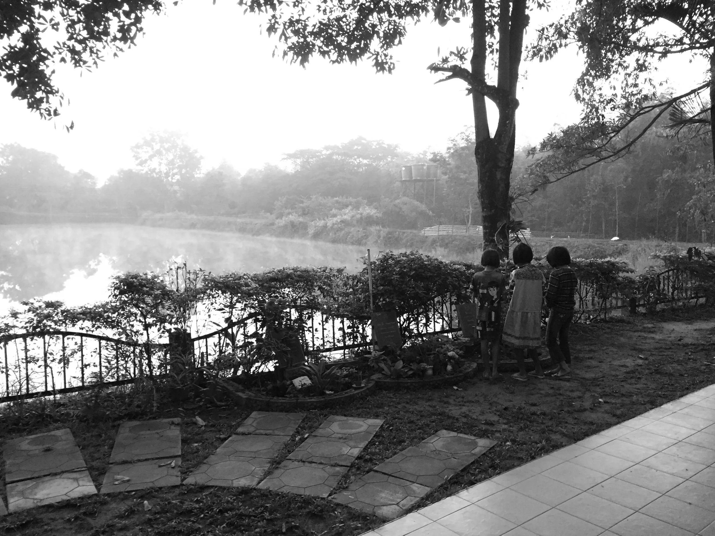  One of the few faceless shots I took. They stopped to look at each of the memorial stones, one belonging to the mother of a girl who was participating in the day, but not pictured here.