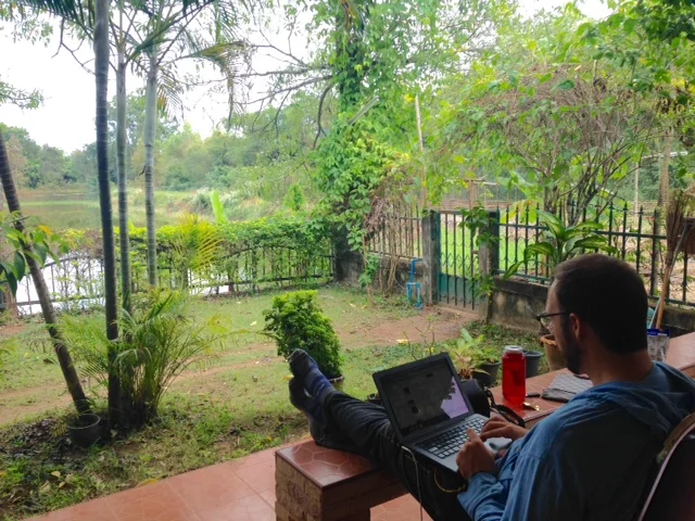 Finally - a moment to breathe! We enjoy internet time with a view of the fish pond at Hands of Hope.