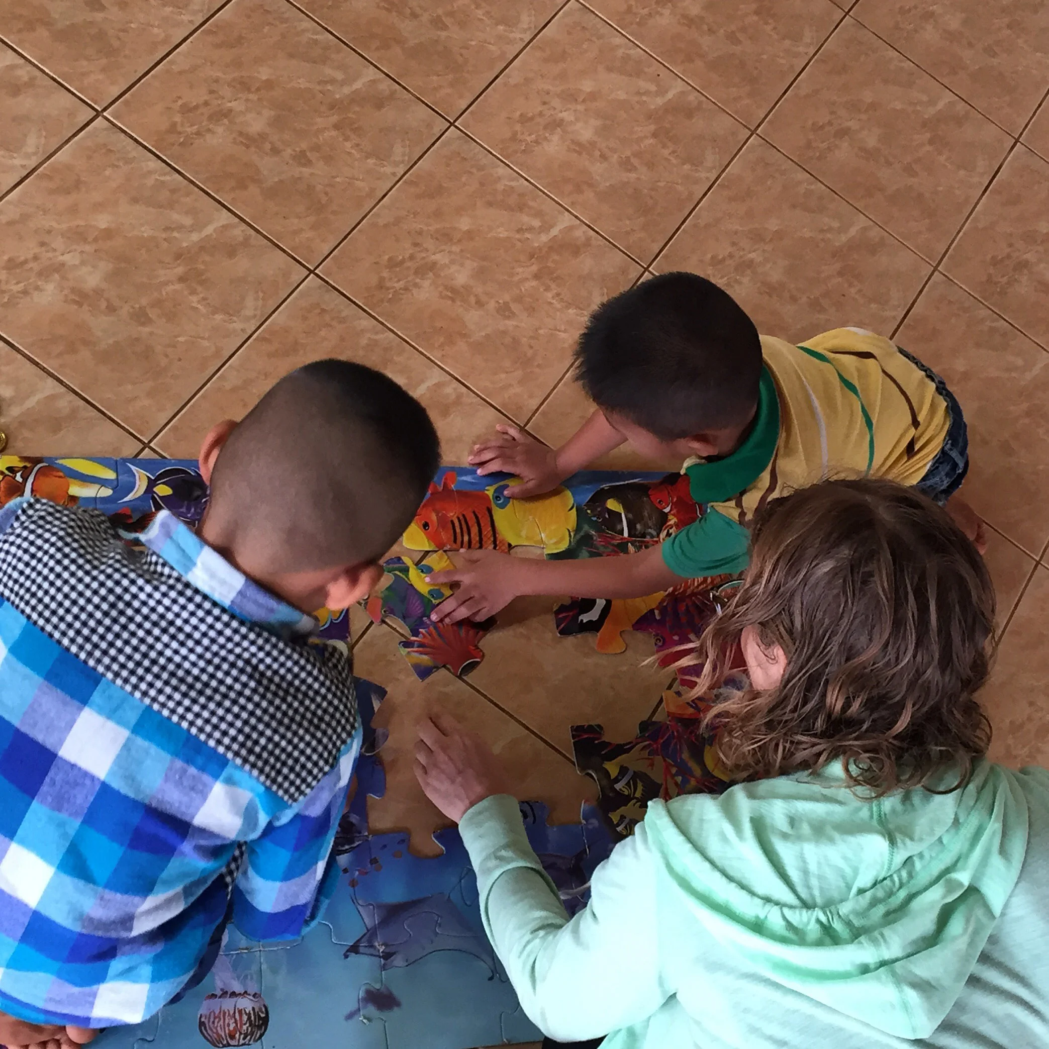  Susan and I put together puzzles with children on Saturday while their parents attended an education and activity day with the patients and social workers.