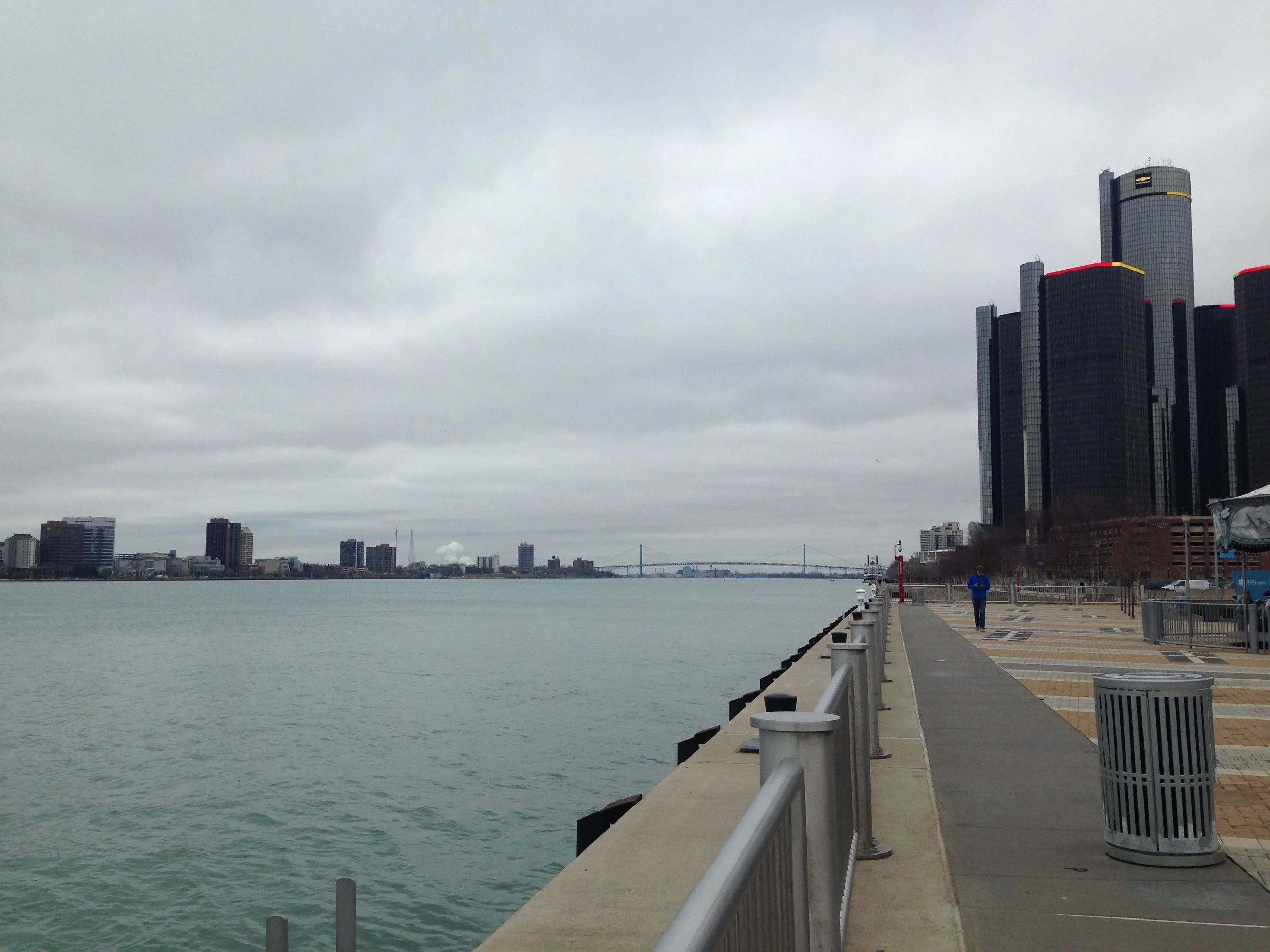 A view of the 'new' Detroit Riverwalk, with the Ambassador Bridge in the background and Windsor to the left.