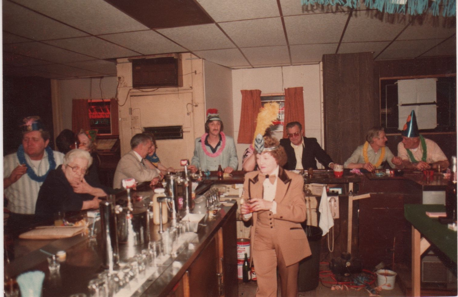 Grandma Dorrie, in her cocoa-hued finest. She held onto the tuxedo long after selling the bar. It was tailored!