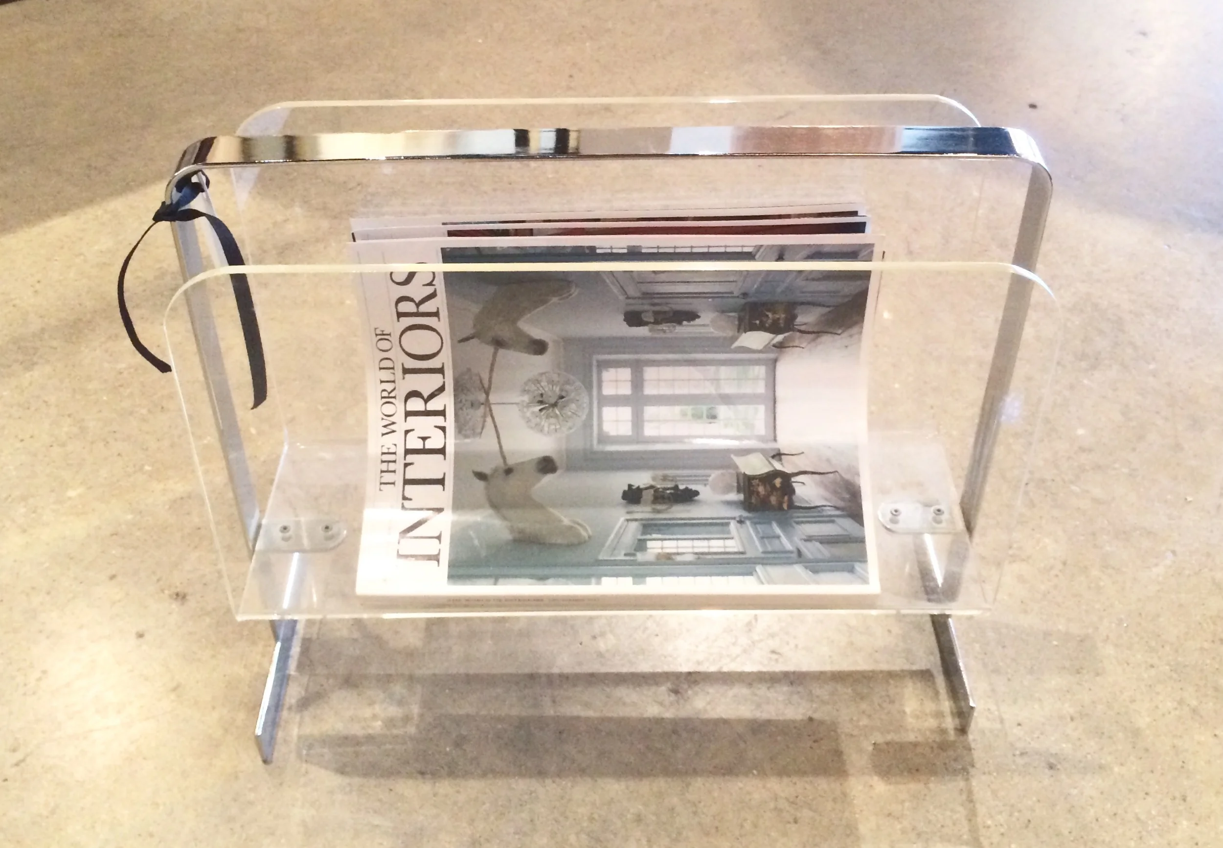 SOLD   Milo Baughman chrome & lucite magazzine rack