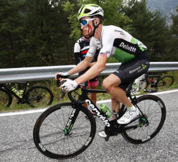 Big ringing the final climb battered and bruised, but not broken. PC: Bettini Photo