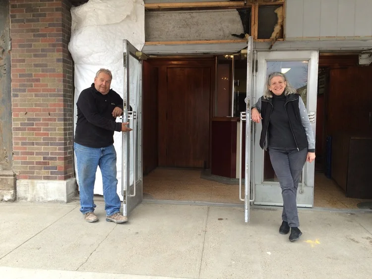 Steve Reed and Marianne Fons stand outside The Iowa's doors, 2015.