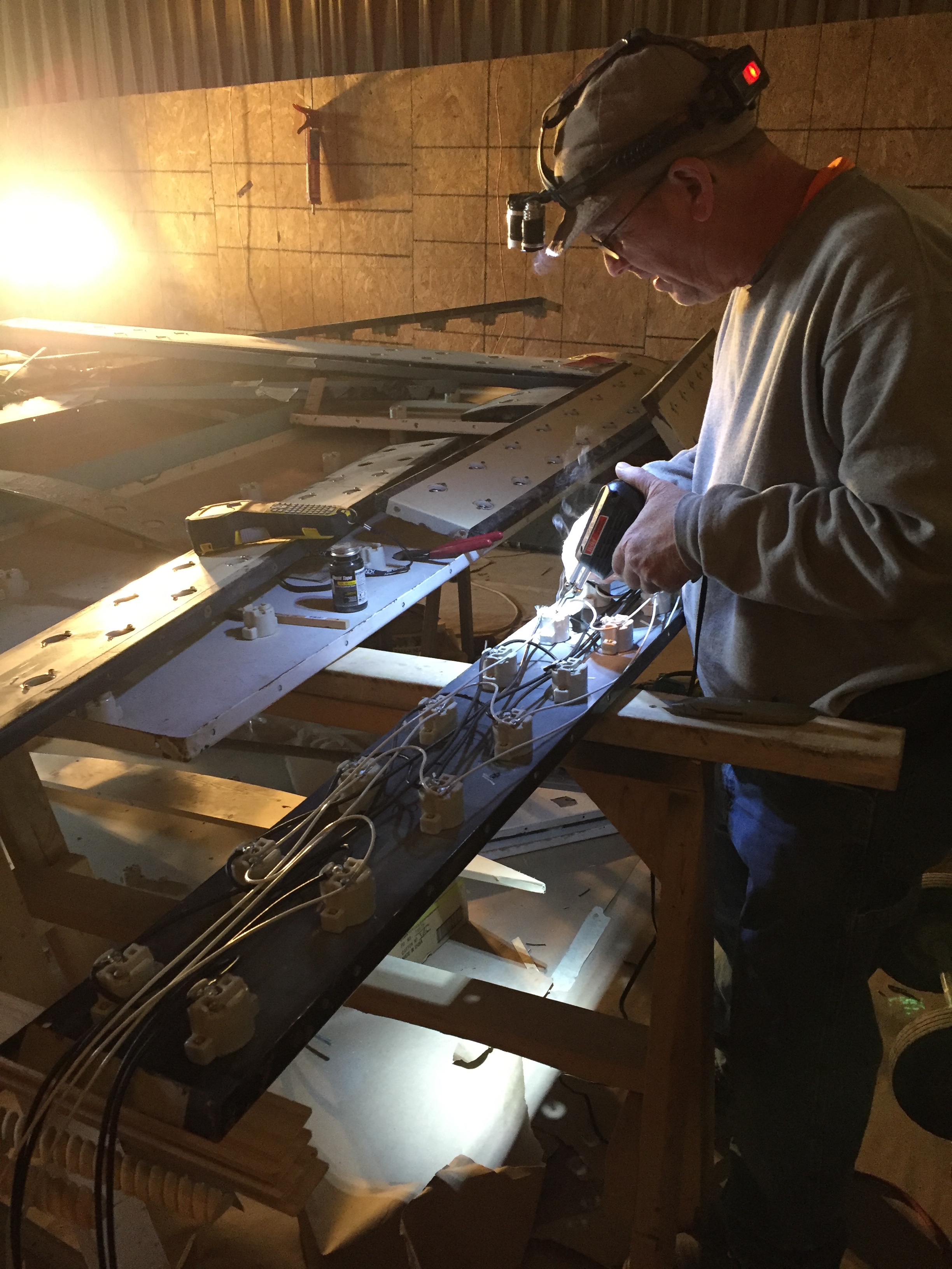 Our amazing electrician Bob Swanson solders the Iowa's marquee sockets, May 2017.