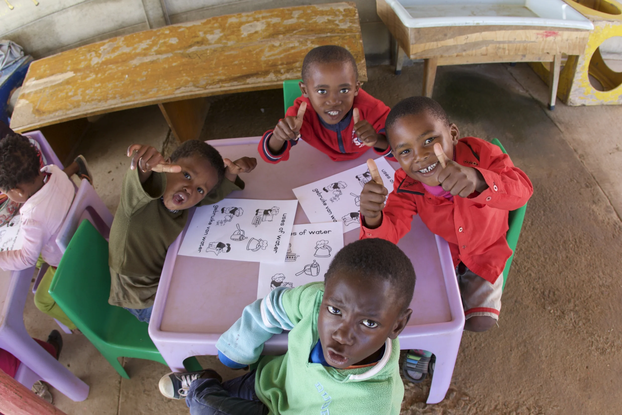 The Langbos Creche & Care Centre currently serves as a pre-school for up to 50 children, as well as a soup kitchen, HIV support group, and community center for the greater Langbos community. We are working together with the Langbos community and the Langbos Creche & Care Centre to help improve the lives of the children and families of Langbos. For more information, visit http://www.intsikelelo.org/langbos-creche-care-centre/