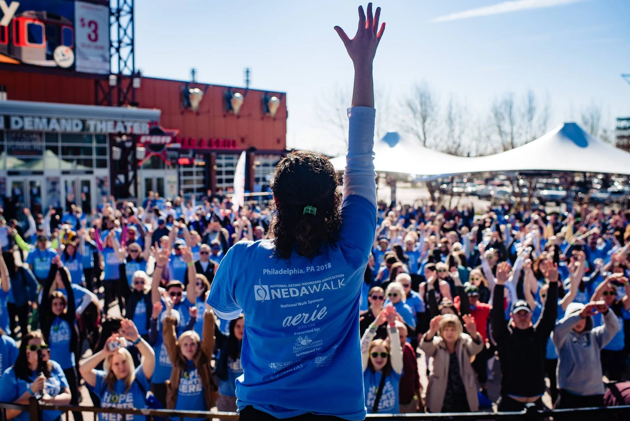 Bridget leading yoga at the 2018 Philly NEDA walk.