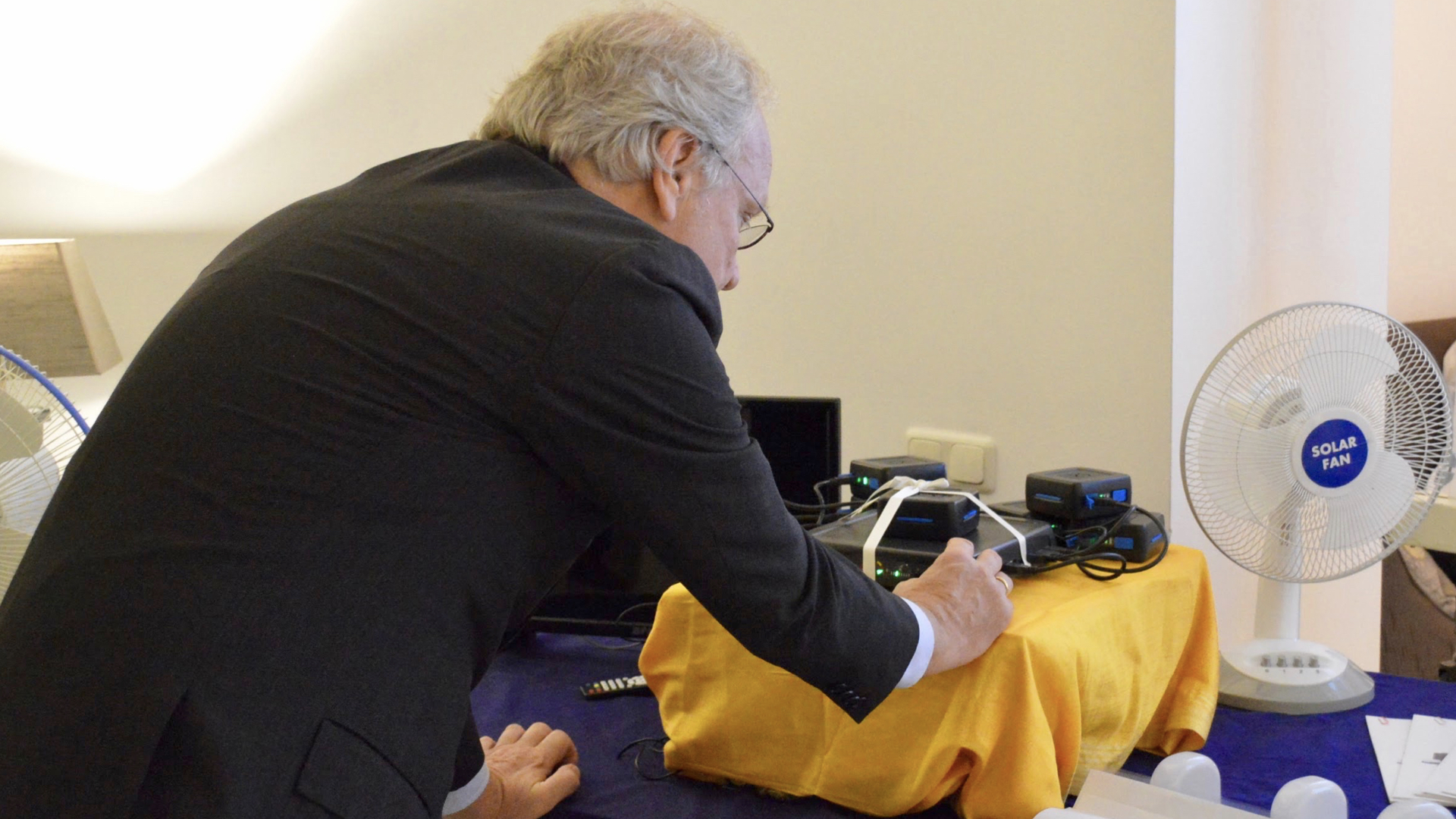 Dutch Ambassador Alphonso Stoeling launching the Rural Spark Energy Router by activating it with the received token. The router is then registred to the Rural Spark servcie platform.