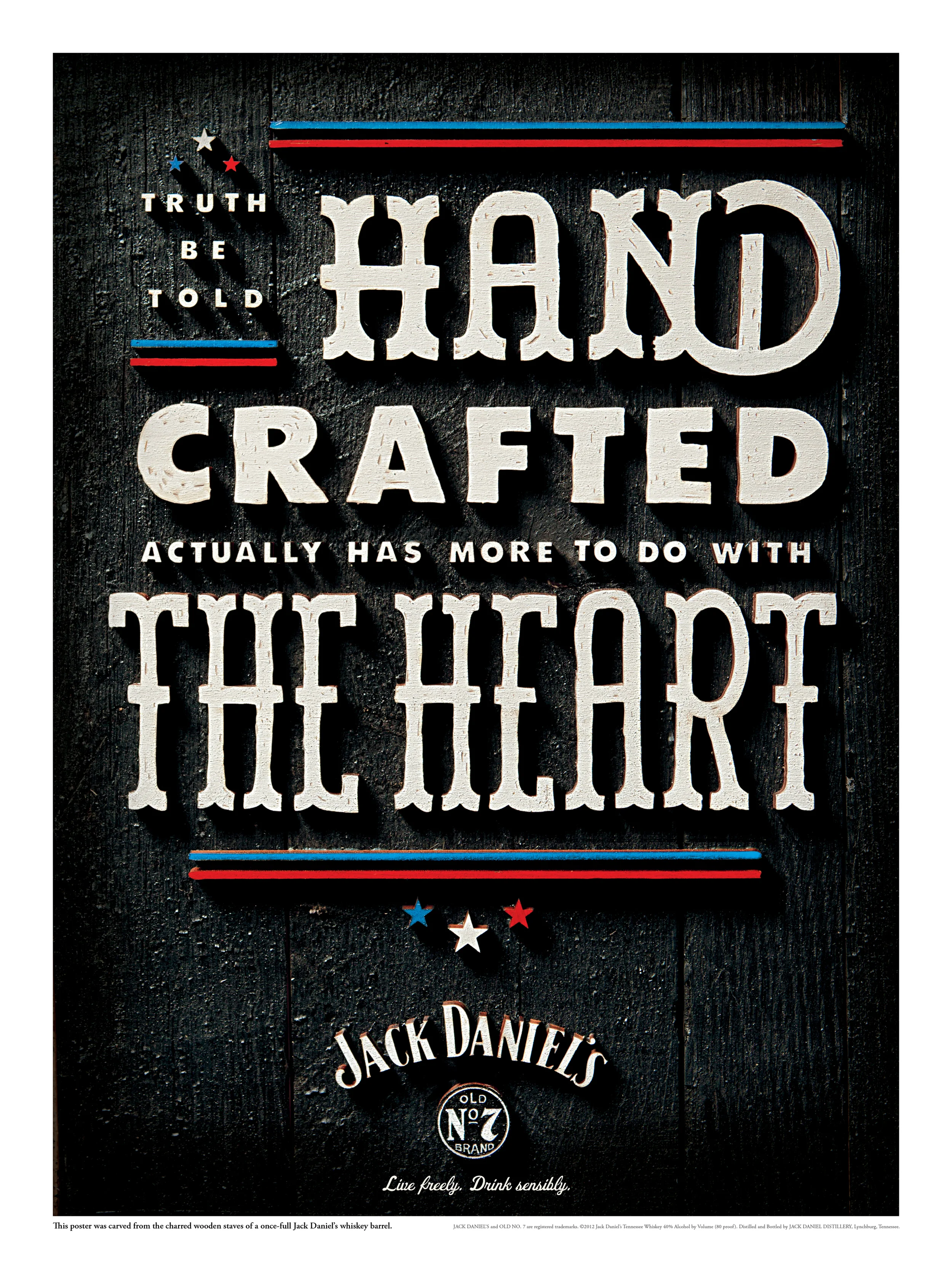 This poster was carved from the charred wooden staves of a once-full Jack Daniel's whiskey barrel.