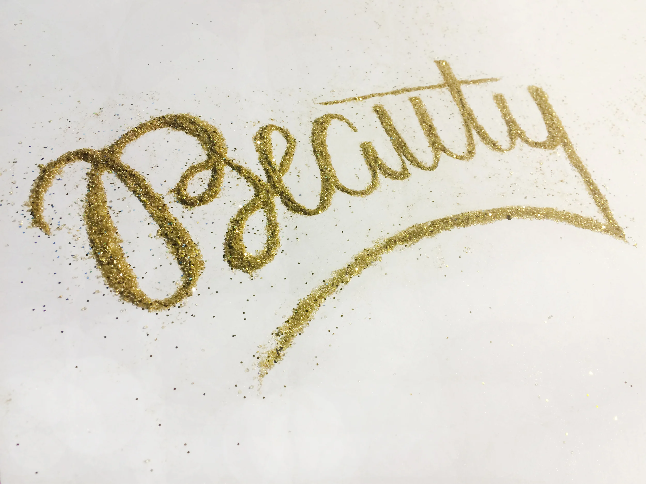 Experiment with writing with loose glitter