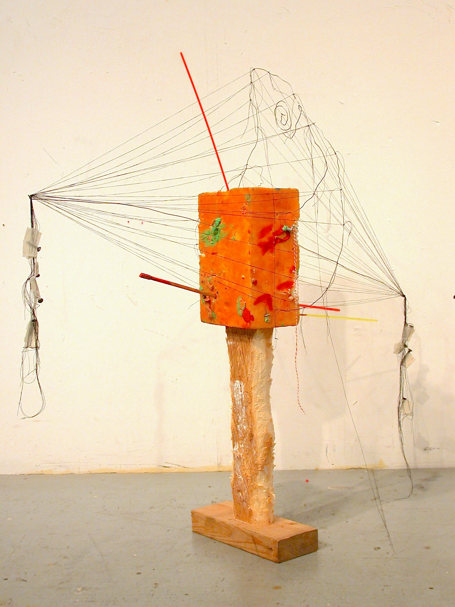 Untitled (Orange Brick). 2012, 31" x 31" x 18" Wood, string, wire, foam, beeswax, screws, plastic rods, modeling clay, pushpins.