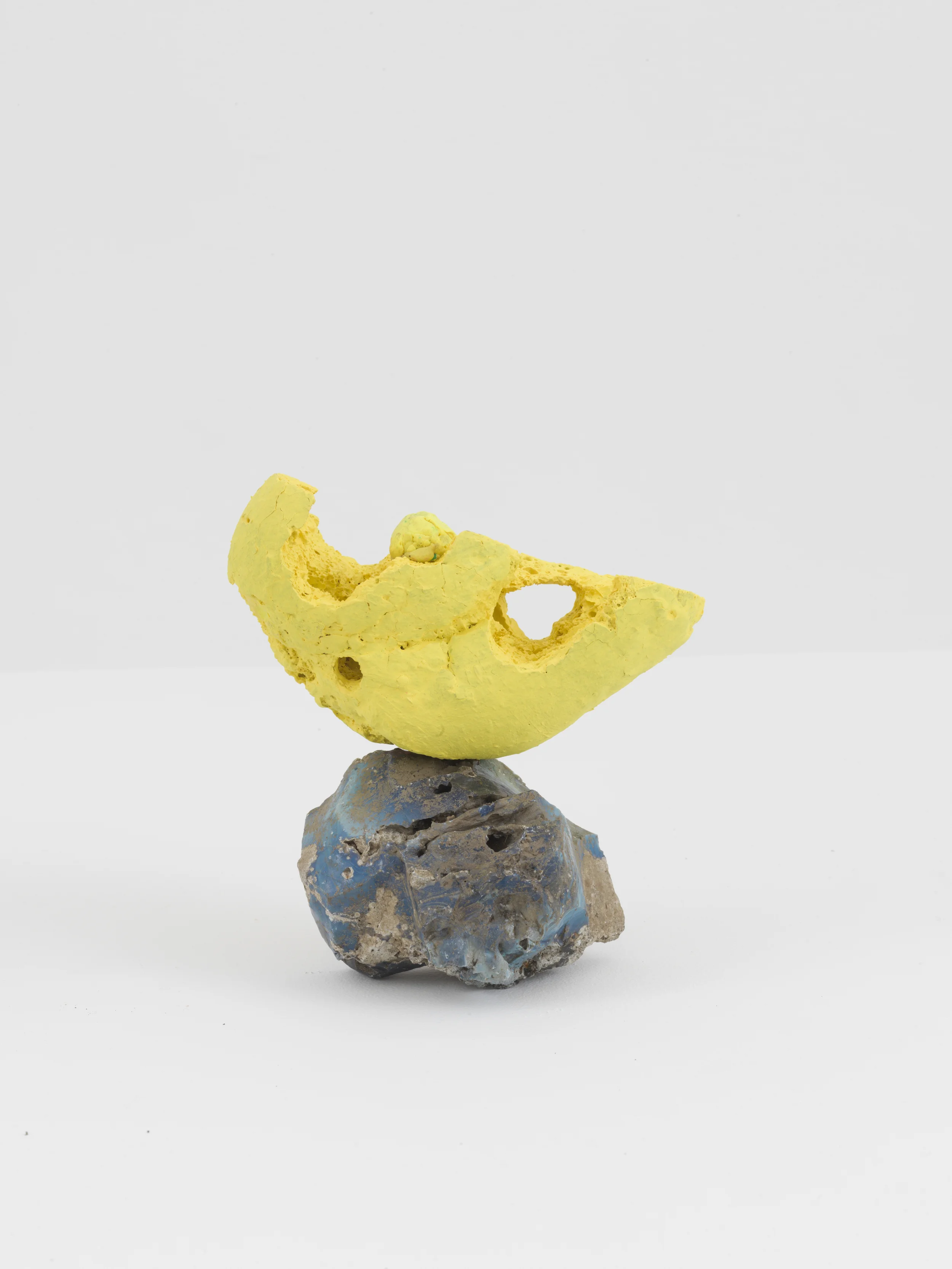 Driftloaf (Yellow on Slag), 2015. Slag, bread, paint, modeling clay 7 x 6 x 3.5 inches