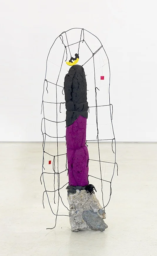 Driftloaf Totem (Purple/Black), 2016, 50" x 19" x 4 3/4", Bread, paint, stone, concrete, wire, yarn, thread, metal, modeling clay, mylar