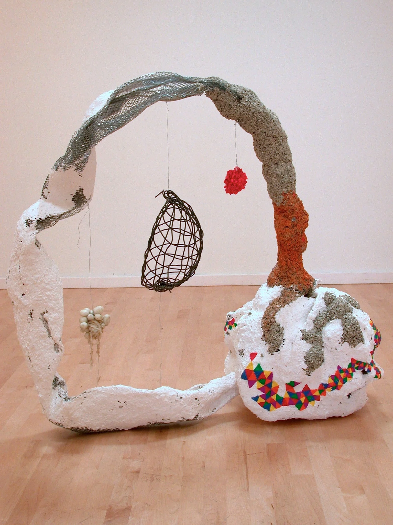 Three Hanging Forms, 2010, metal, papier-mâché, modeling clay, plastic, wire, rocks, latex, newspaper, 42" x 21" x 45"