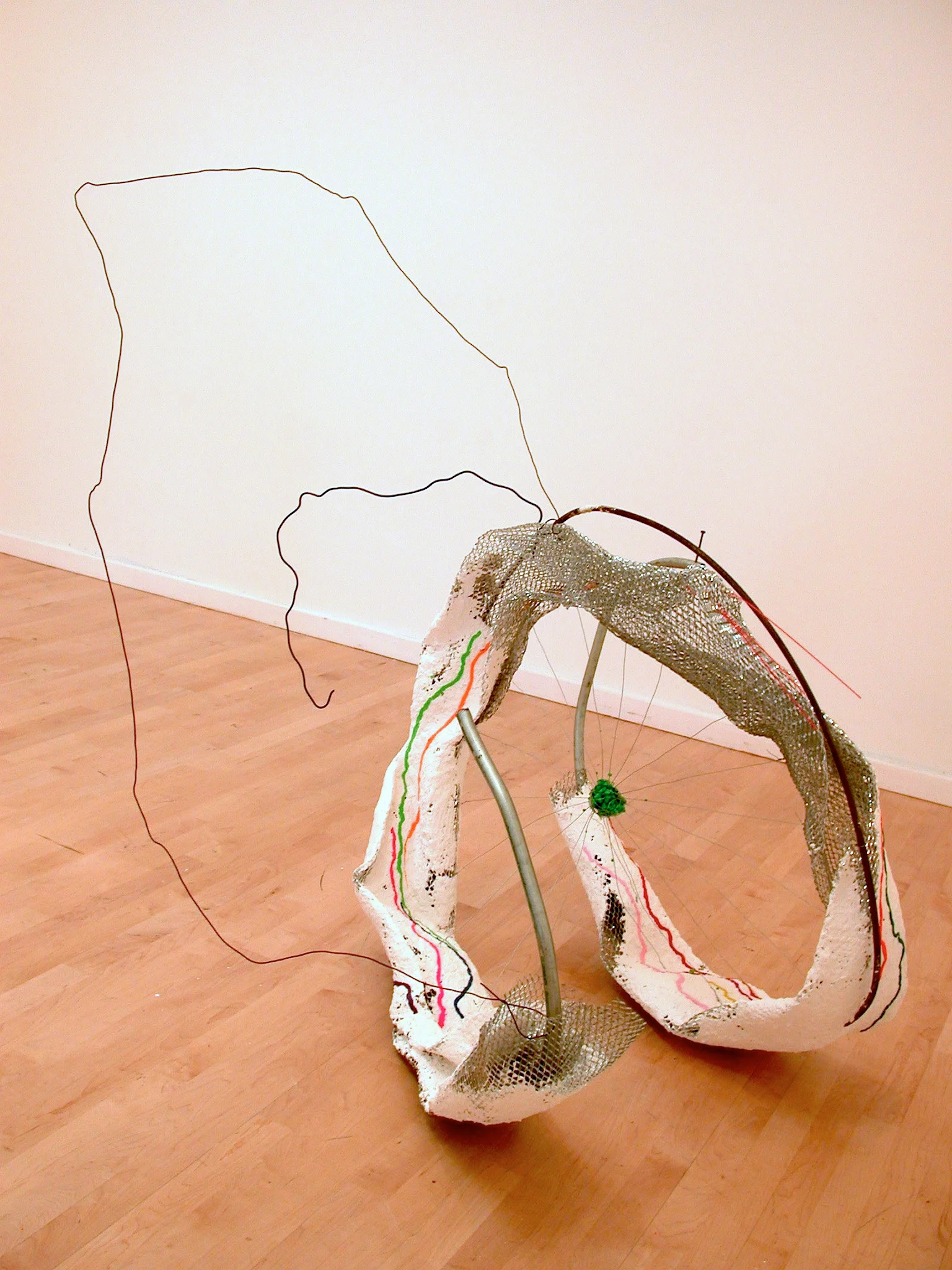 Untitled (Spiral with green center), 2010, metal, papier-mâché, modeling clay, plastic, wire, rocks, 47" x 50" x 37"