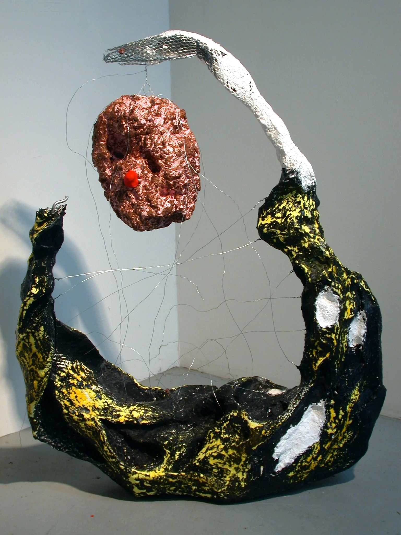 Unnecessary Fixation, 2010, metal, papier-mâché, beeswax, paint, modeling clay, wire, acrylic, 43" x 12" x 34"