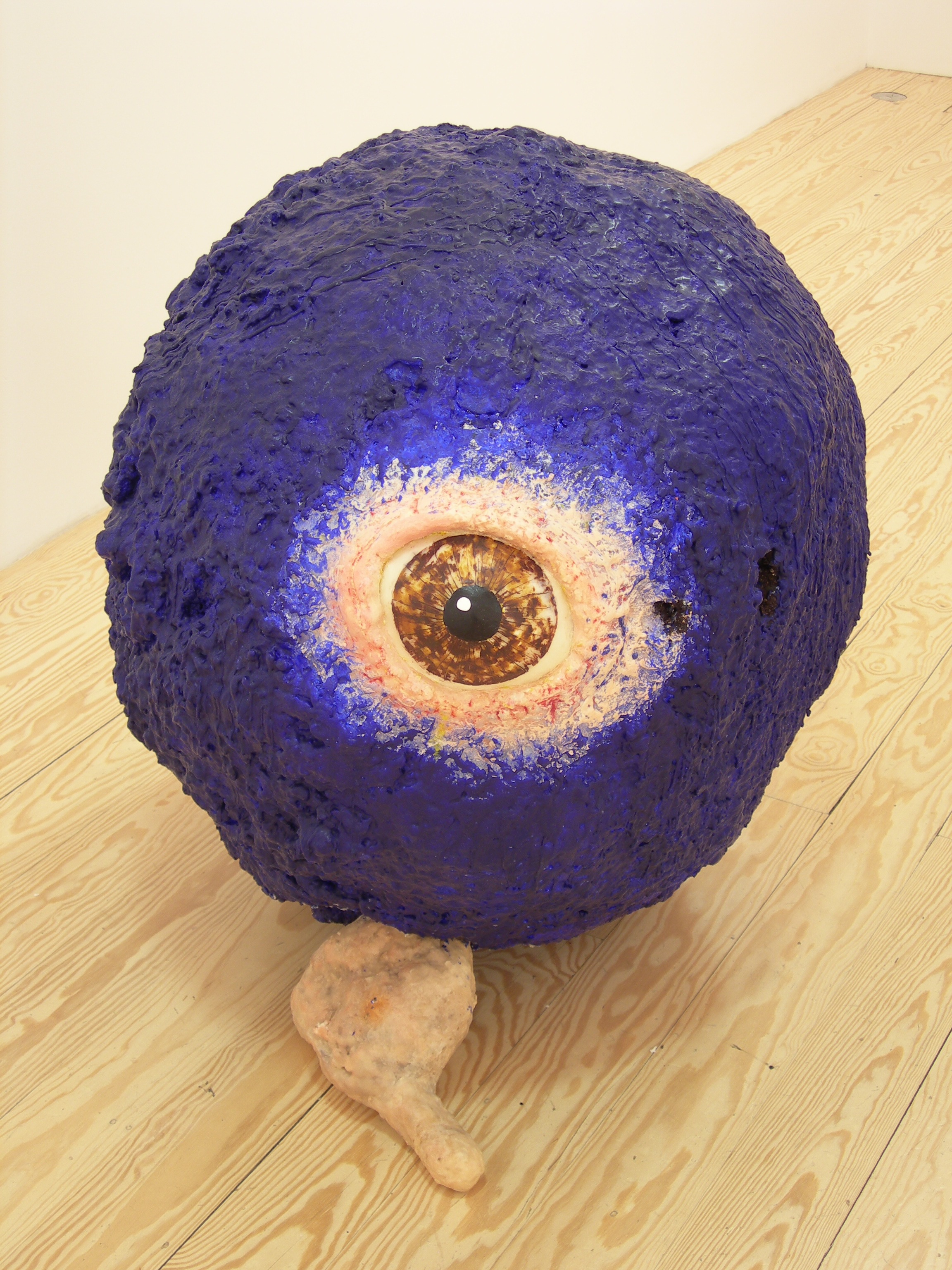 Untitled (large blue eye), 2007, beesxwax, papier maché, wood, metal and pigment, 35 x 31 x 38 inches