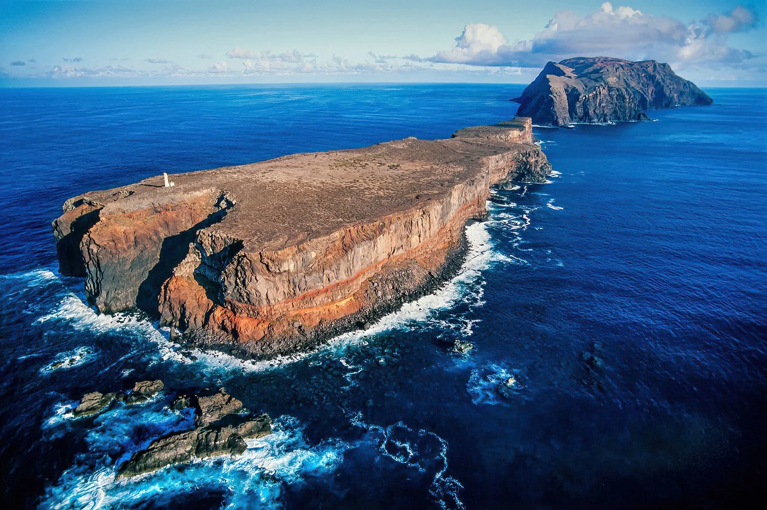 An aerial photo of the Desertas Islands, Portugal.  The Desertas Islands are a protected nature reserve where human access is tightly limited.